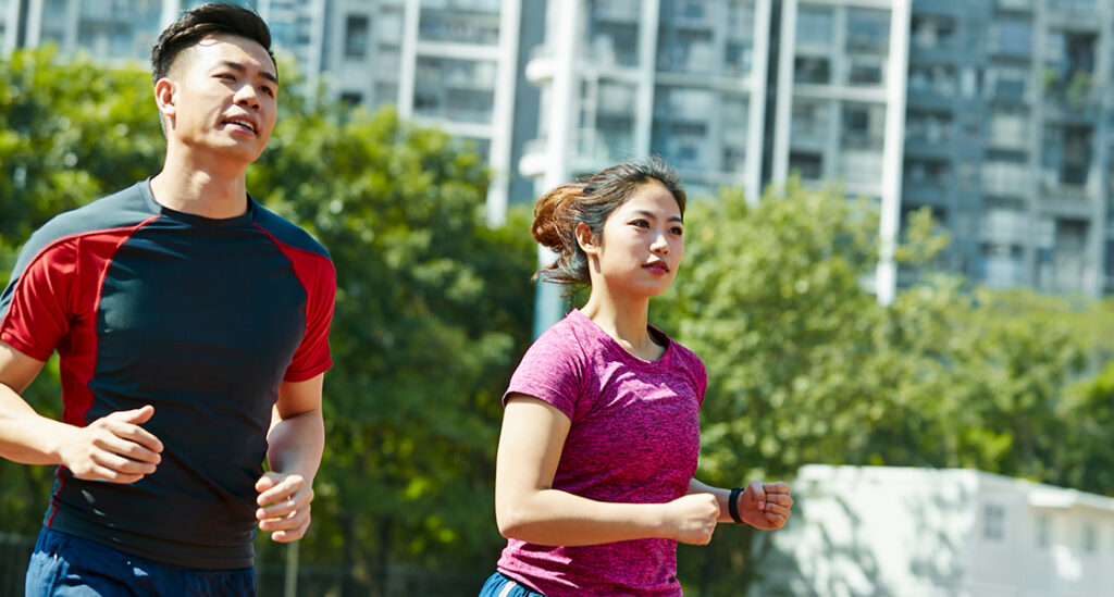 Asian couple exercising