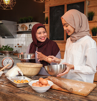 Malay family baking together