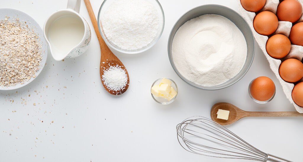 Baking ingredients and tools on table