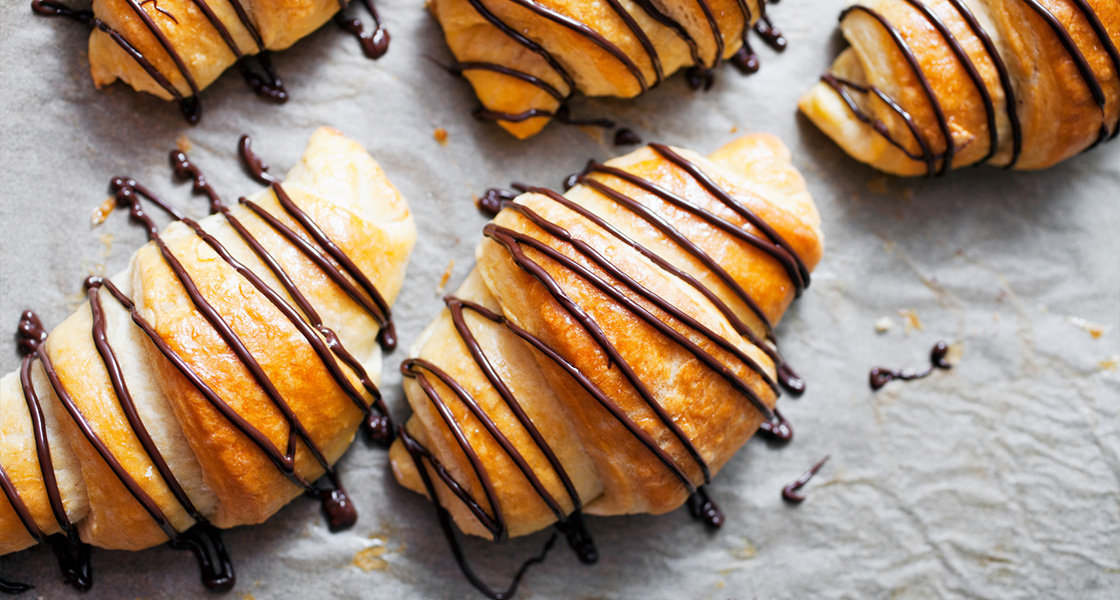 Chocolate Croissants on Baking Sheet