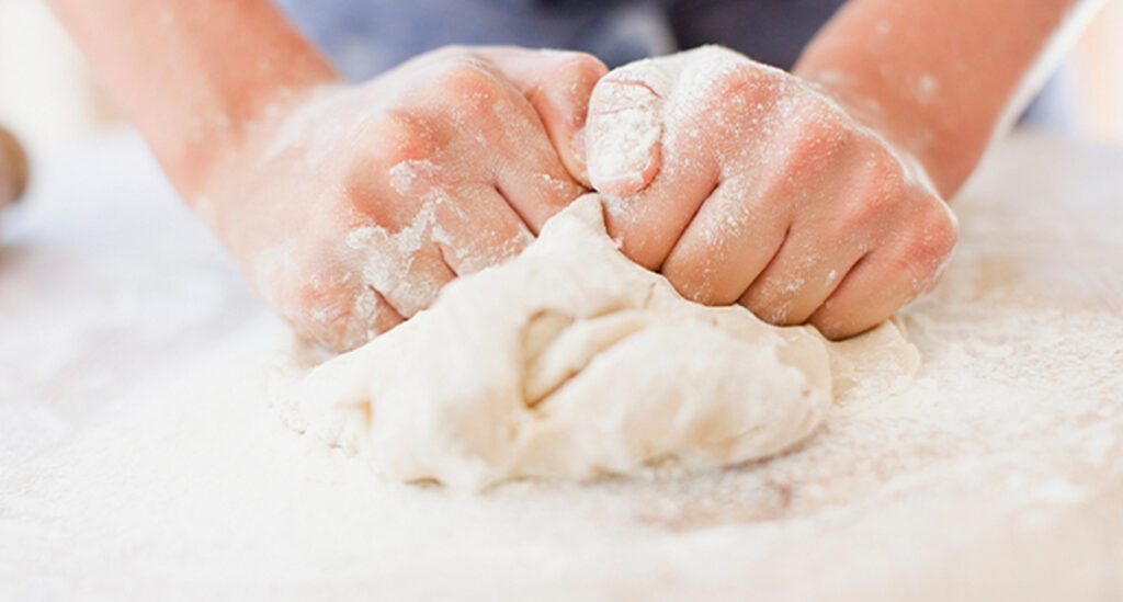 Dough being kneaded