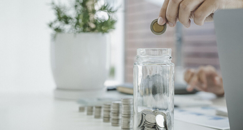 Stacked coins being kept in a container